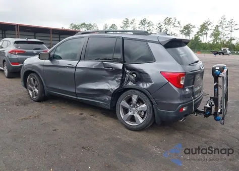 2021 Honda Passport 2Wd Touring from USA, damaged, VIN 5FNYF7H98MB012921